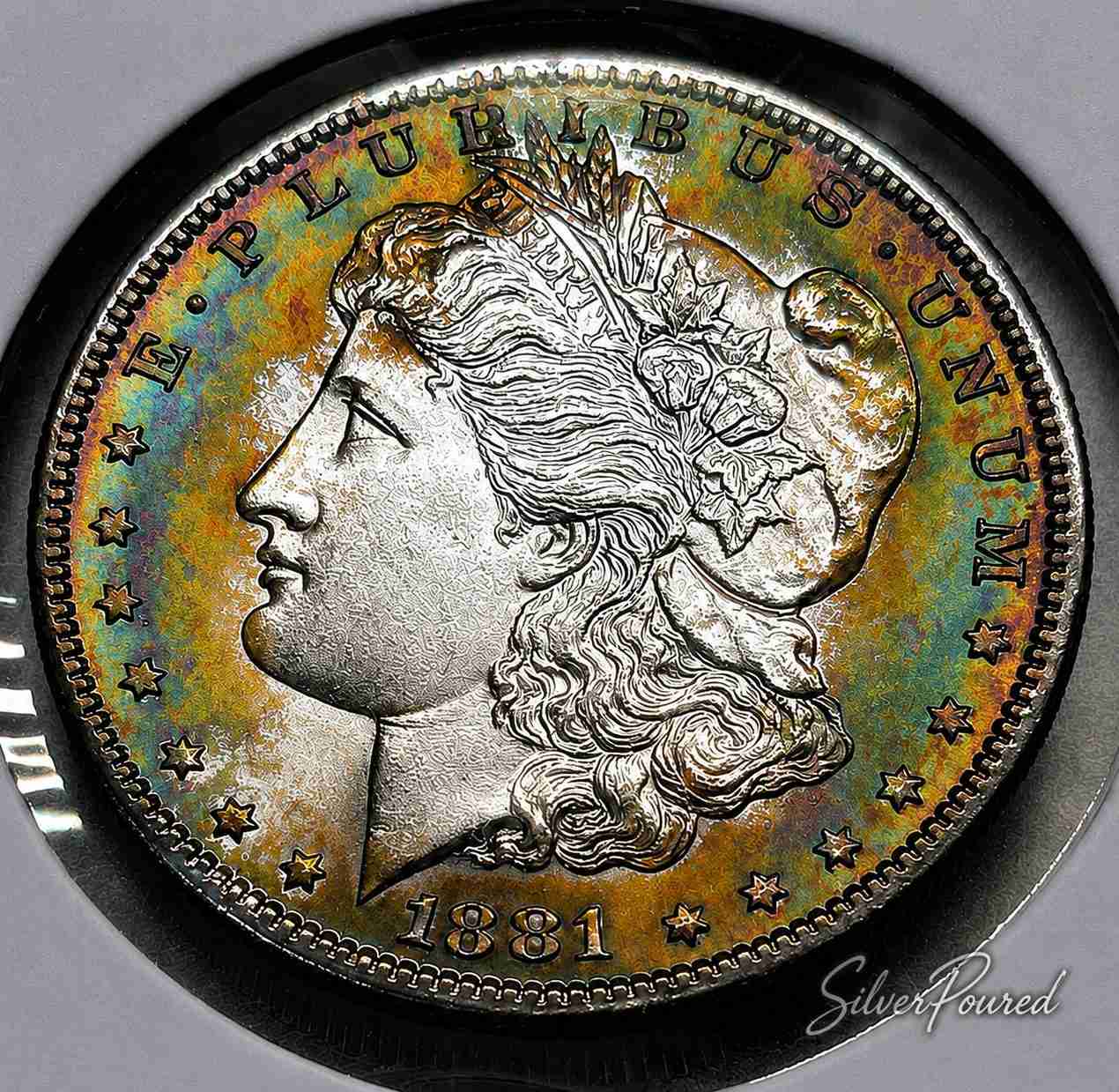 1881 rainbow toned Morgan Silver Dollar obverse showing original silver surfaces for Morgan Silver Dollar Value research