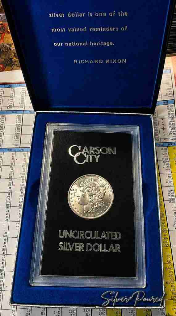 1882-CC Morgan Silver Dollar in original GSA government holder from the Carson City Mint.