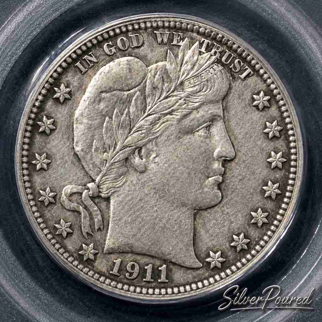 Close-up obverse of a 1911 Barber Quarter certified PCGS MS62 containing 0.18084 troy ounces of .900 fine silver.