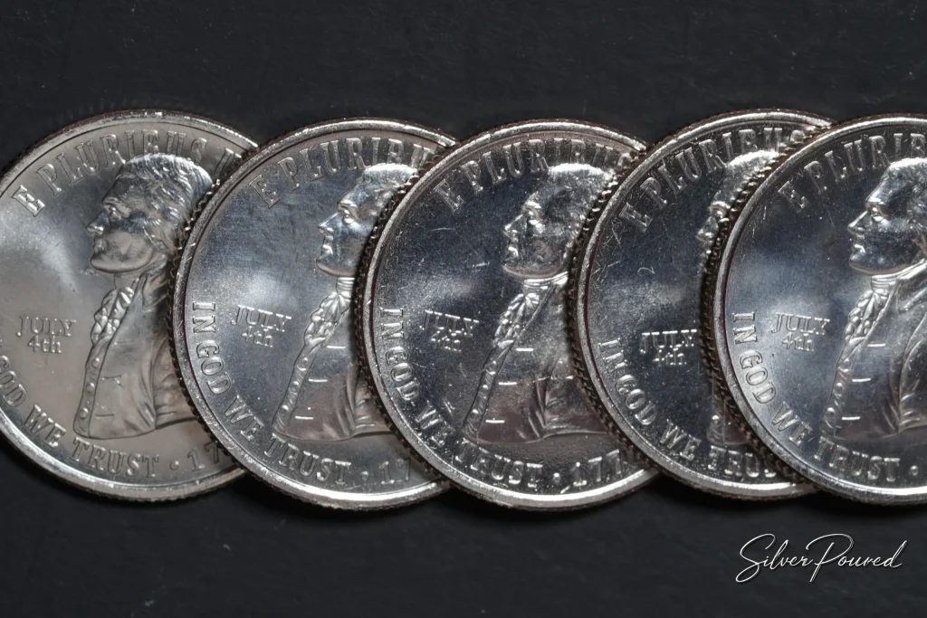 Five 2026 July 4 Privy quarters featuring the Semiquincentennial quarter designs.