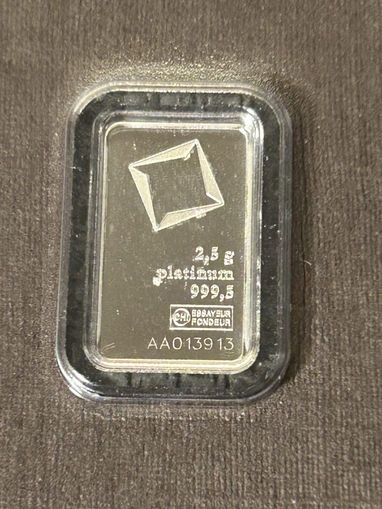 Serialized platinum bar with unique serial number and assay markings
