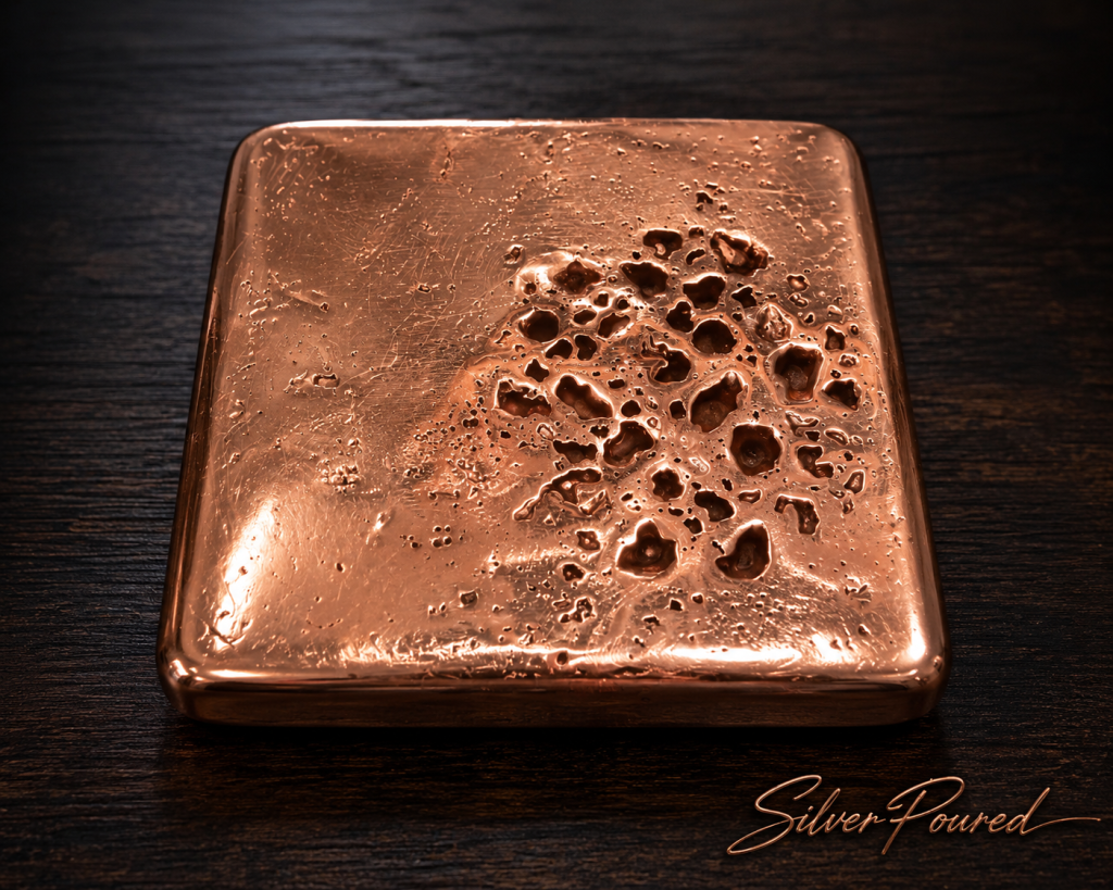 5.2 lb hand-poured .999 copper bullion collection featuring 2 oz antique-finish copper rounds, skull pours, marlin designs, Glock-inspired artisan copper pieces, and handcrafted collectible copper bullion on the SilverPoured Shop Copper page