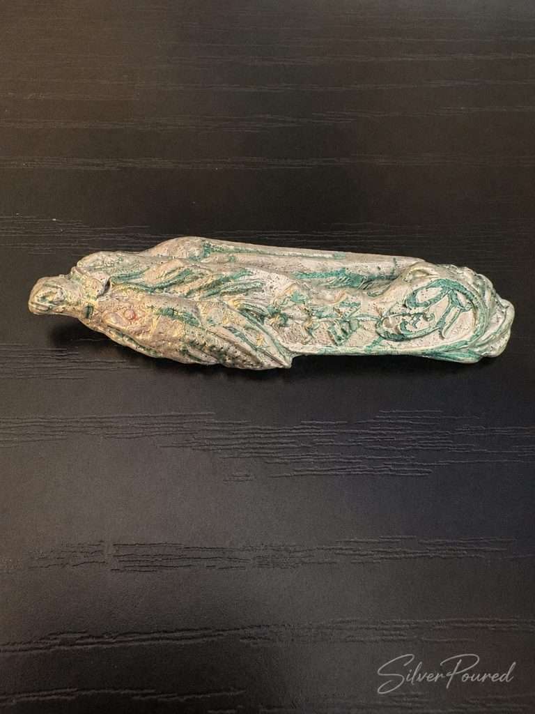 3.3 oz .999 hand poured silver folding pocket knife closed, showcasing handcrafted silver artistry and collectible hand poured silver.