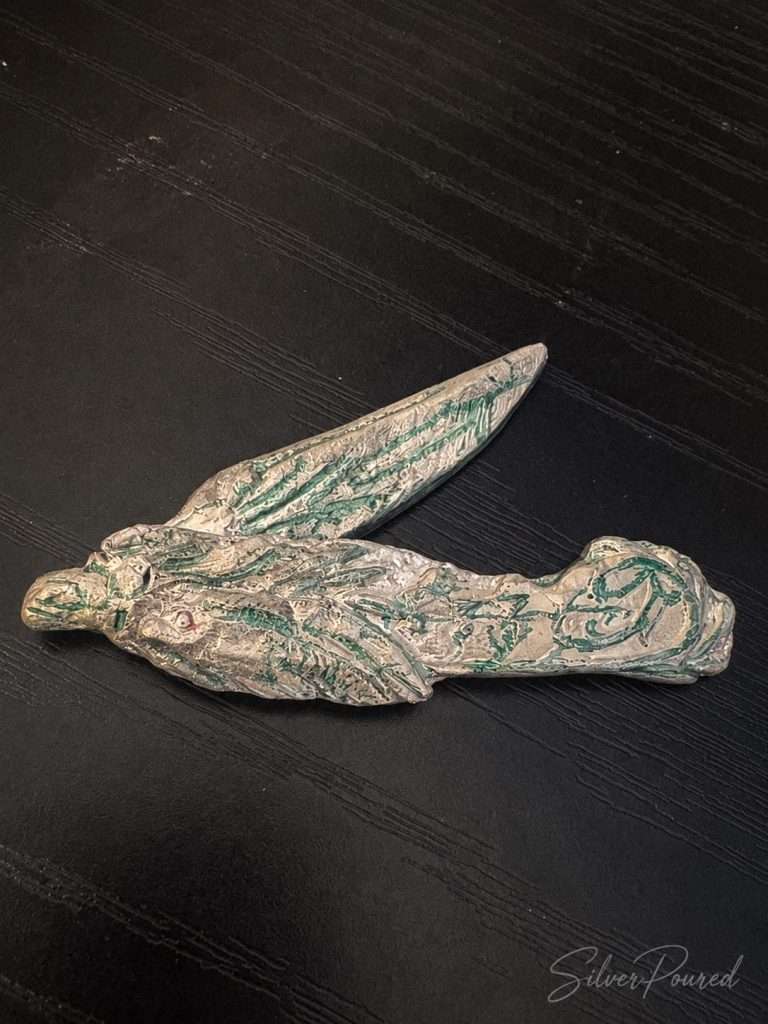 3.3 oz .999 hand poured silver folding pocket knife by SilverPoured illustrating handcrafted silver artistry and collectible hand poured silver.