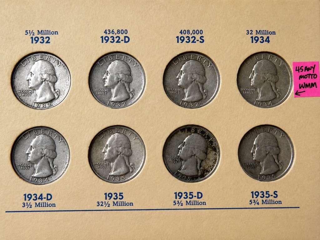 Washington quarter album featuring key date 90% silver quarters from 1932 through 1935, including the scarce 1932-D and 1932-S issues