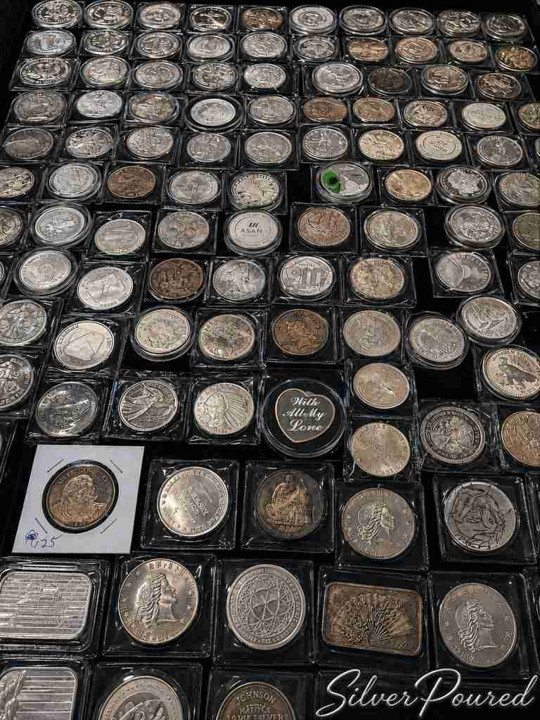Large collection of silver coins, rounds, and bullion displayed together for comparing silver melt value, silver content, and intrinsic precious metals value.